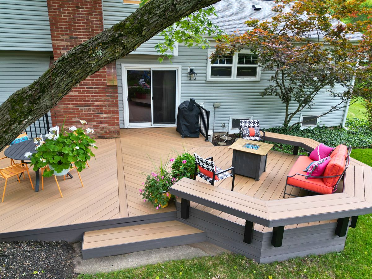 Backyard composite deck with steps and outdoor seating